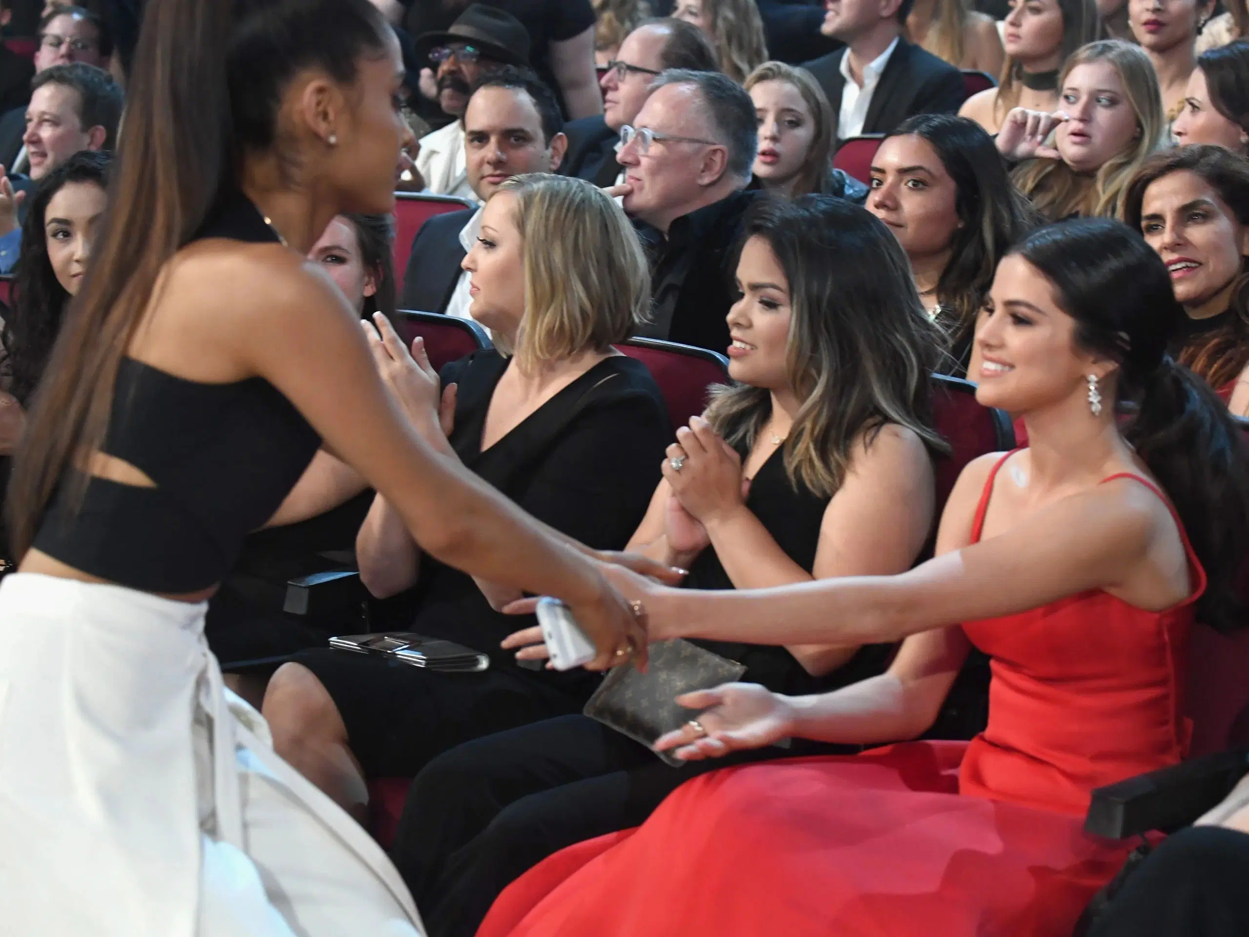 Selena Gomez Shares High Praise for Ariana Grande's Music story artwork